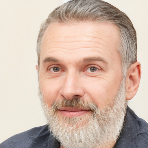 Joyful white middle-aged male with short  brown hair and brown eyes