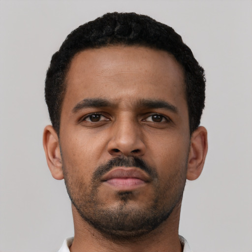 Neutral black young-adult male with short  black hair and brown eyes