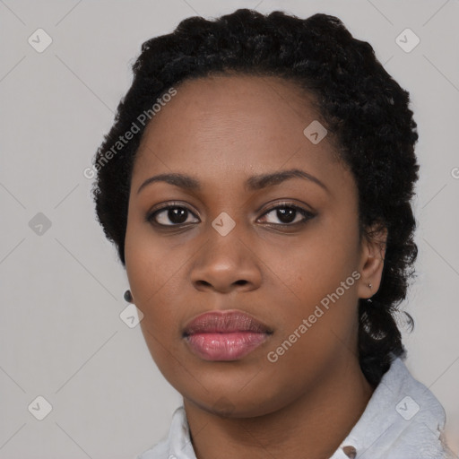 Neutral black young-adult female with short  black hair and brown eyes