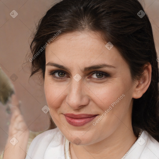 Joyful white adult female with medium  brown hair and brown eyes