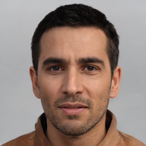 Neutral white young-adult male with short  black hair and brown eyes