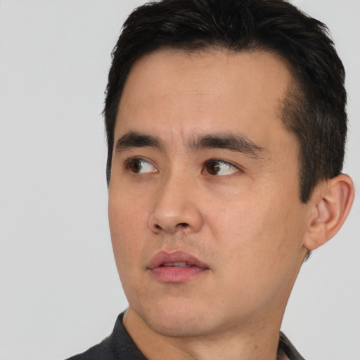 Neutral asian young-adult male with short  black hair and brown eyes
