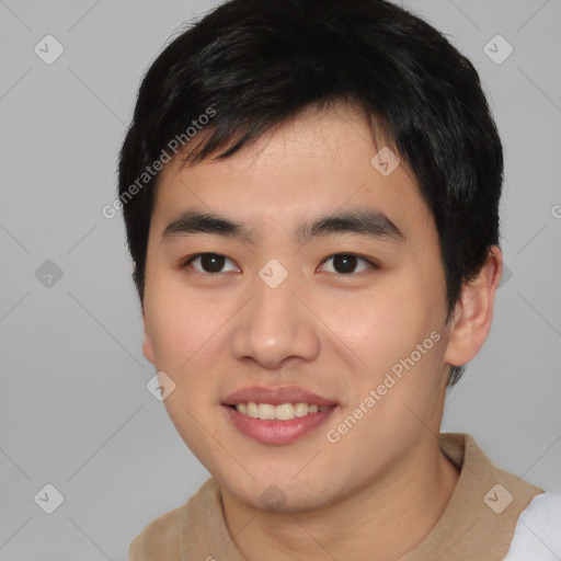 Joyful asian young-adult male with short  black hair and brown eyes