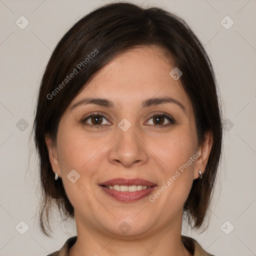 Joyful white adult female with medium  brown hair and brown eyes