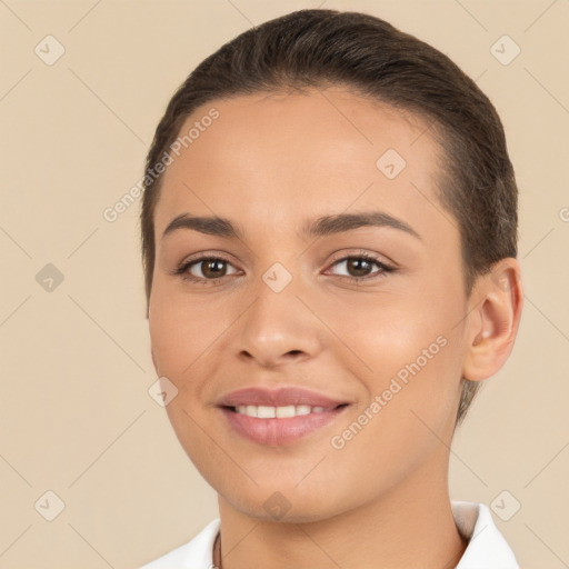 Joyful white young-adult female with short  brown hair and brown eyes