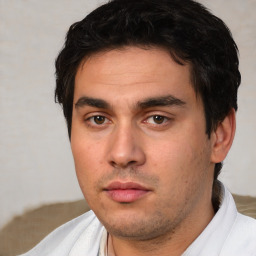Neutral white young-adult male with short  black hair and brown eyes