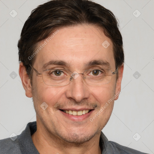 Joyful white adult male with short  brown hair and grey eyes