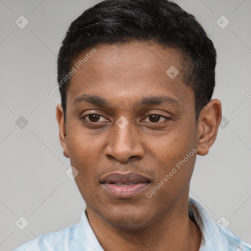 Joyful latino young-adult male with short  black hair and brown eyes