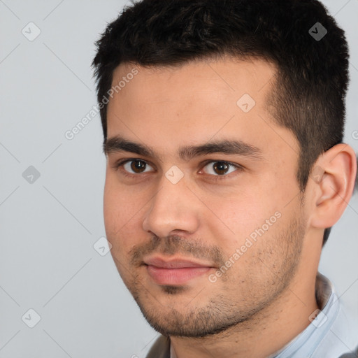 Neutral white young-adult male with short  black hair and brown eyes