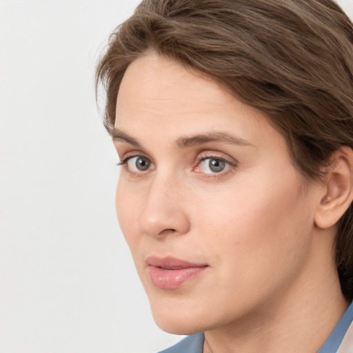 Neutral white young-adult female with medium  brown hair and grey eyes