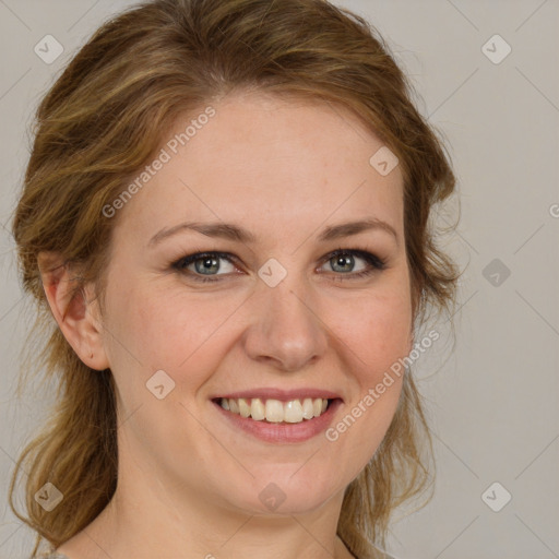 Joyful white young-adult female with medium  brown hair and blue eyes