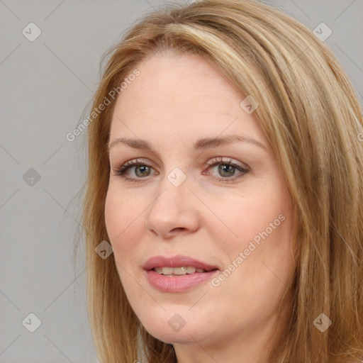 Joyful white adult female with long  brown hair and brown eyes