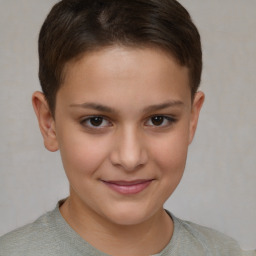 Joyful white child female with short  brown hair and brown eyes