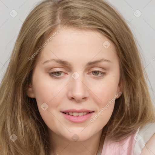 Joyful white young-adult female with long  brown hair and green eyes