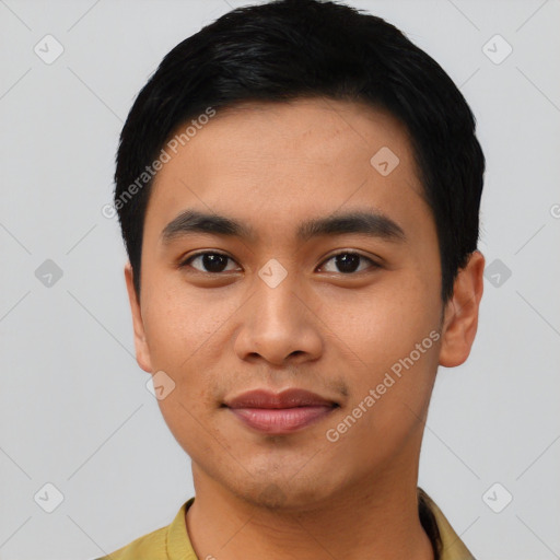 Joyful asian young-adult male with short  black hair and brown eyes