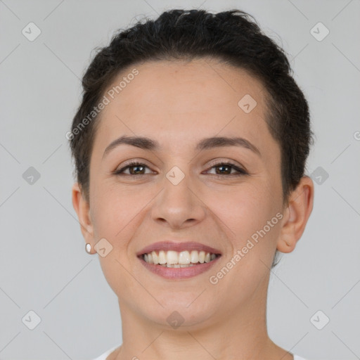 Joyful white young-adult female with short  brown hair and brown eyes