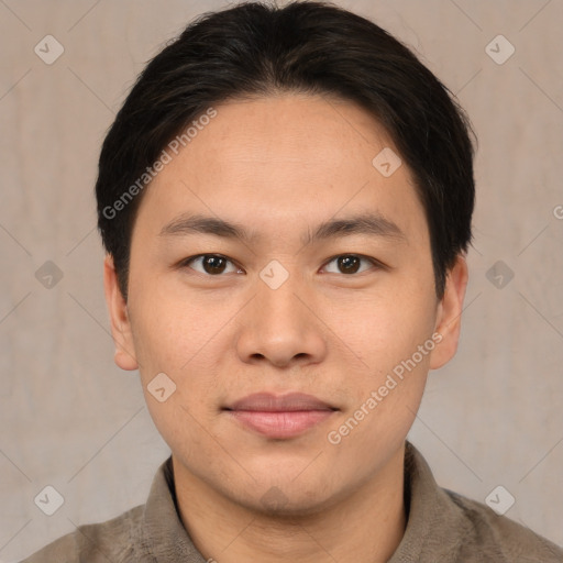 Joyful asian young-adult male with short  brown hair and brown eyes