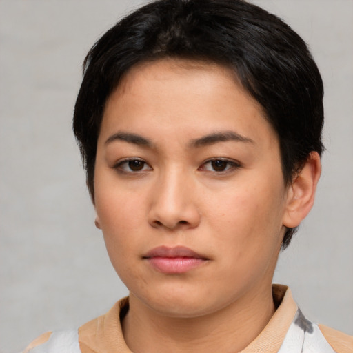 Neutral asian young-adult female with short  brown hair and brown eyes