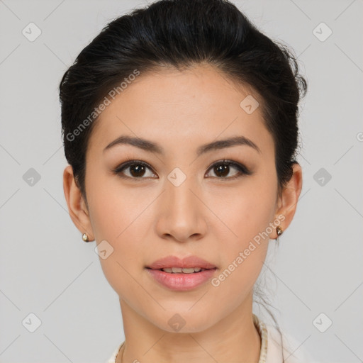 Joyful asian young-adult female with short  brown hair and brown eyes