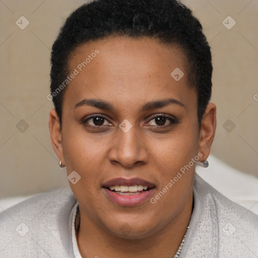 Joyful black young-adult female with short  brown hair and brown eyes