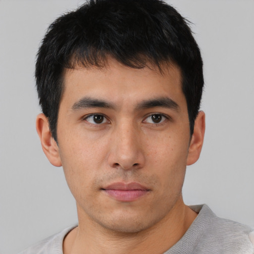 Neutral asian young-adult male with short  brown hair and brown eyes