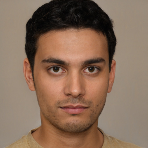 Neutral white young-adult male with short  brown hair and brown eyes
