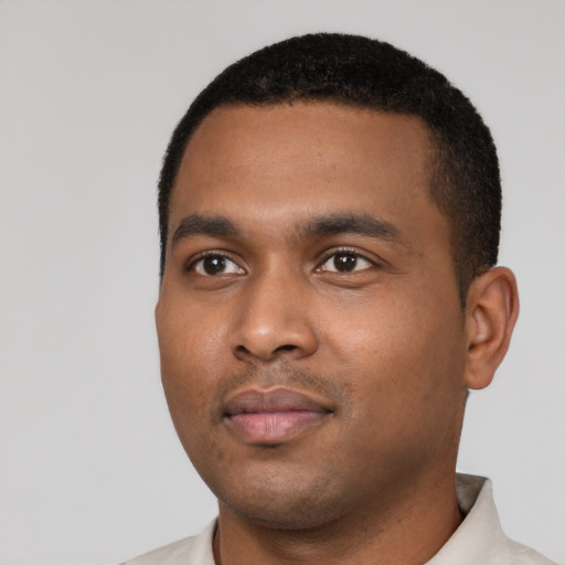Neutral black young-adult male with short  black hair and brown eyes