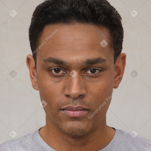 Neutral latino young-adult male with short  black hair and brown eyes