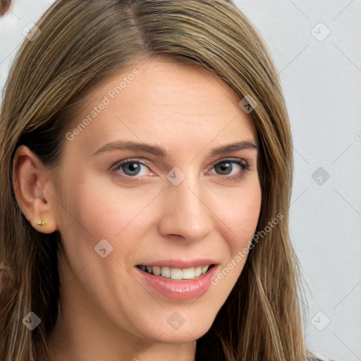 Joyful white young-adult female with long  brown hair and blue eyes