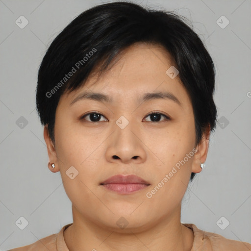 Joyful asian young-adult female with short  brown hair and brown eyes