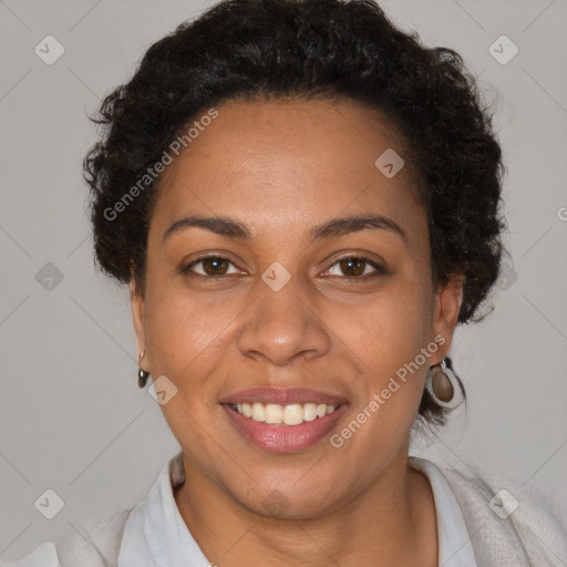 Joyful latino young-adult female with short  brown hair and brown eyes