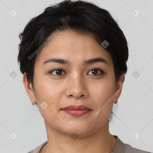 Joyful asian young-adult female with short  brown hair and brown eyes