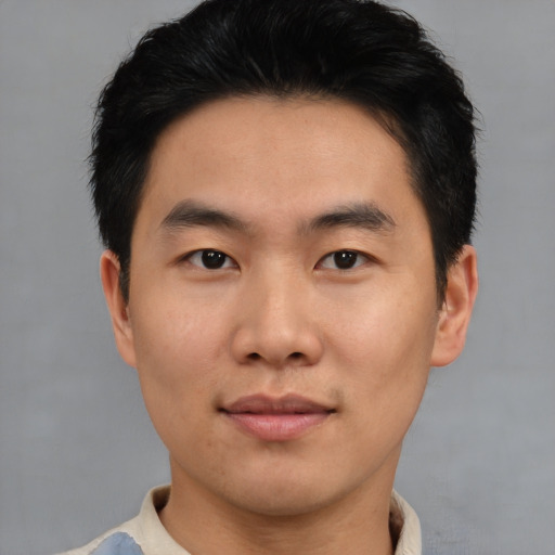 Neutral asian young-adult male with short  black hair and brown eyes