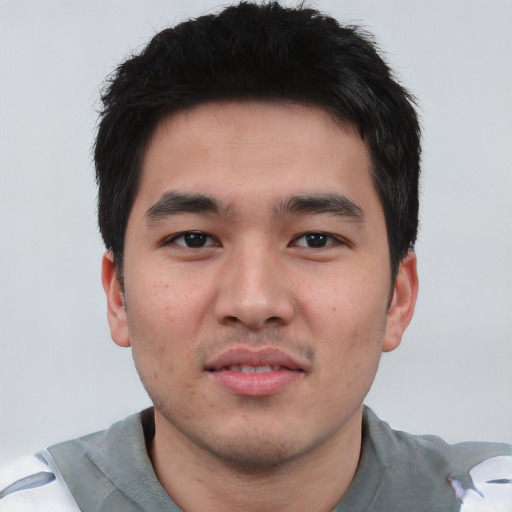Neutral asian young-adult male with short  brown hair and brown eyes