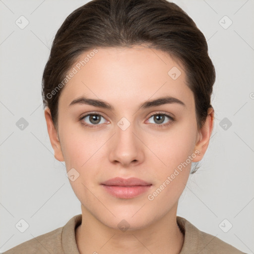 Neutral white young-adult female with short  brown hair and brown eyes