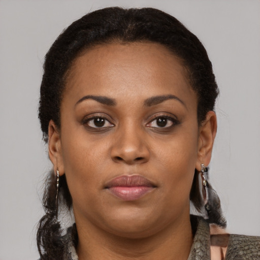 Neutral black young-adult female with short  brown hair and brown eyes