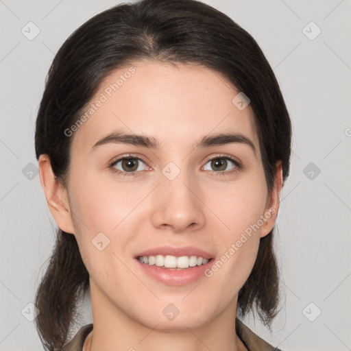 Joyful white young-adult female with medium  brown hair and brown eyes