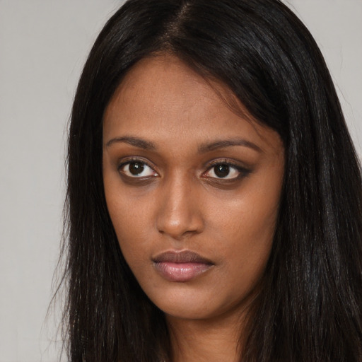 Neutral asian young-adult female with long  brown hair and brown eyes