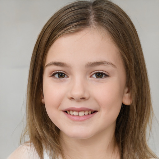 Joyful white child female with medium  brown hair and brown eyes