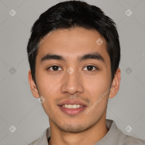 Joyful asian young-adult male with short  black hair and brown eyes