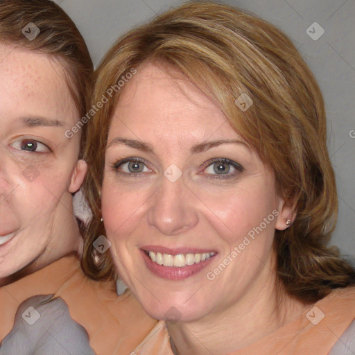 Joyful white adult female with medium  brown hair and blue eyes