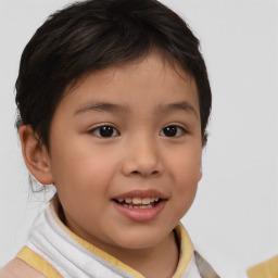 Joyful white child female with short  brown hair and brown eyes