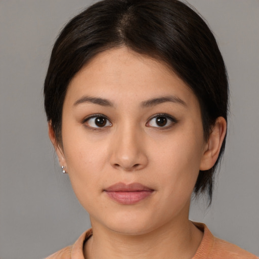 Neutral asian young-adult female with medium  brown hair and brown eyes