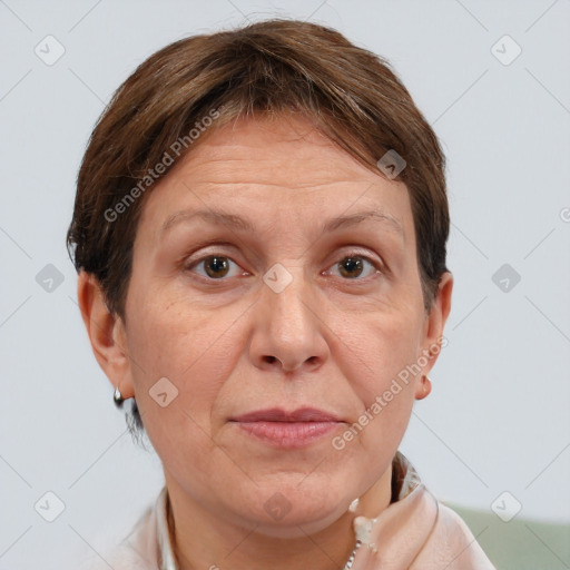 Joyful white adult female with short  brown hair and grey eyes