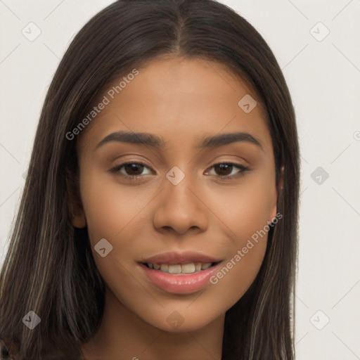 Joyful latino young-adult female with long  brown hair and brown eyes