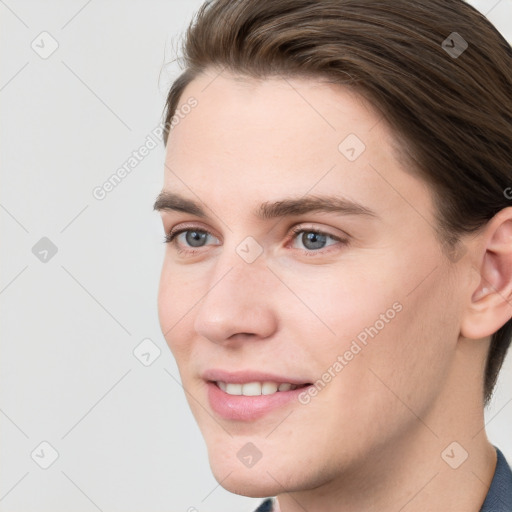 Joyful white young-adult female with short  brown hair and grey eyes