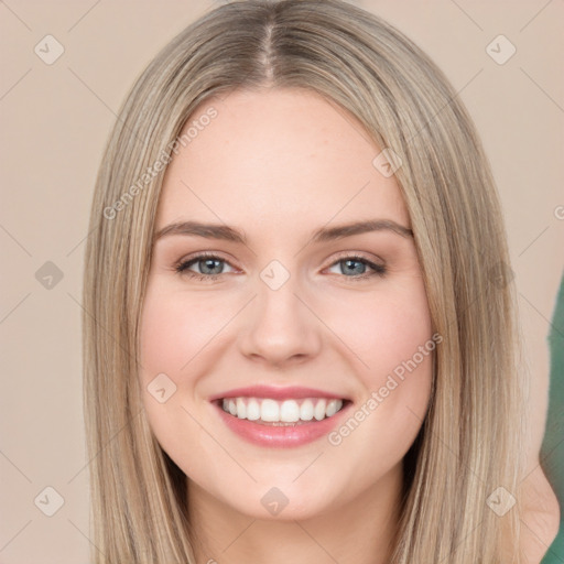 Joyful white young-adult female with long  brown hair and green eyes