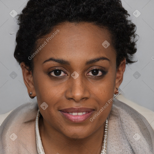 Joyful black young-adult female with short  brown hair and brown eyes