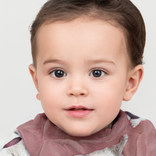 Neutral white child female with short  brown hair and blue eyes