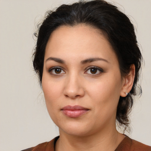 Neutral latino young-adult female with medium  brown hair and brown eyes